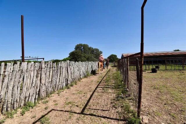 a view of swimming pool with a chair