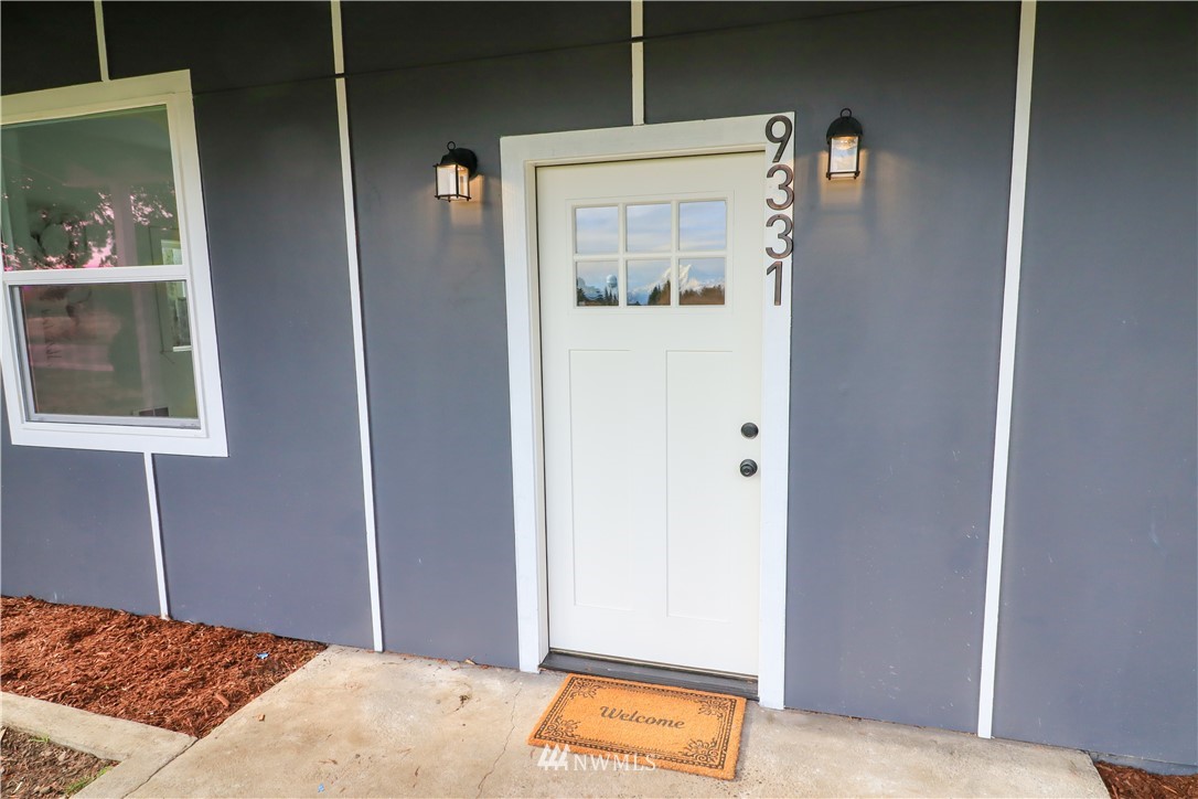 9331 Cullens Road Southeast Yelm, WA 98597 - Photo 2 of 28 a bedroom with a bed and closet