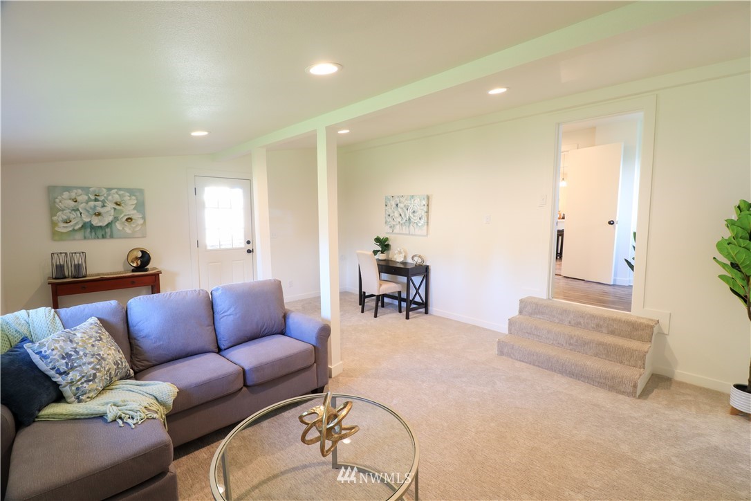 9331 Cullens Road Southeast Yelm, WA 98597 - Photo 24 of 28 a living room with furniture