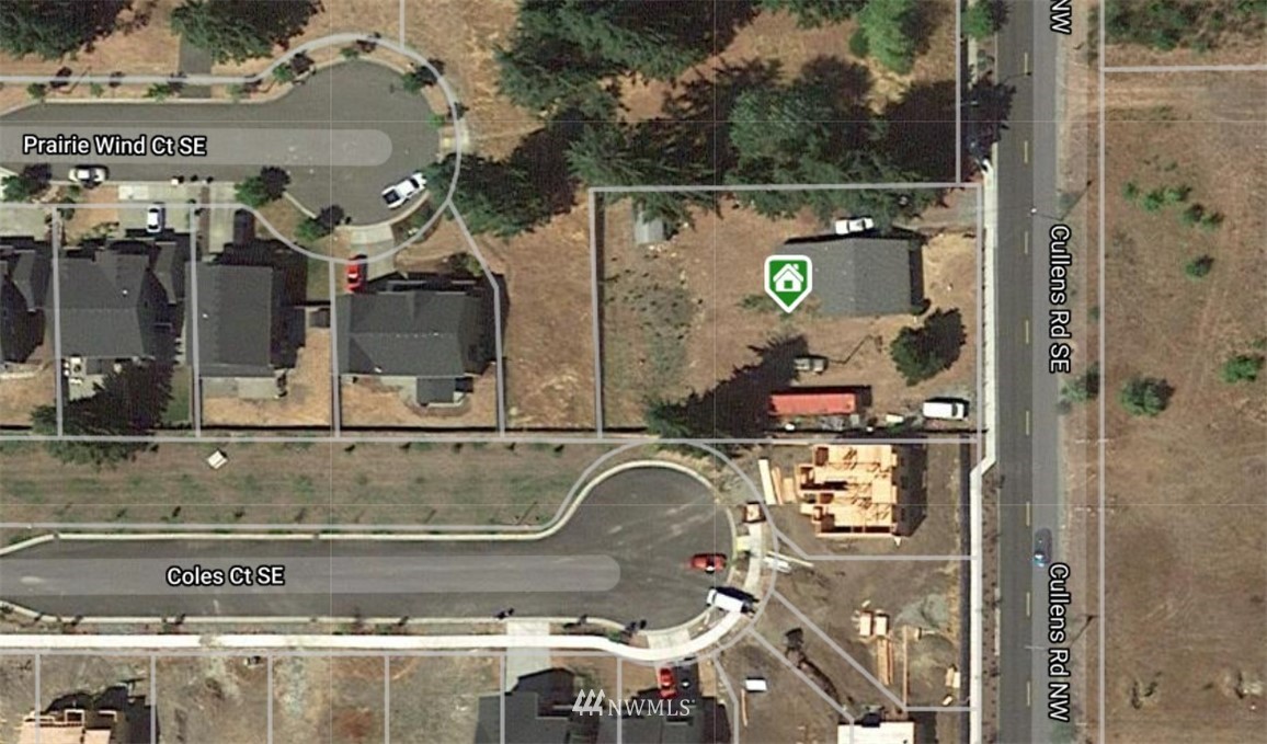 9331 Cullens Road Southeast Yelm, WA 98597 - Photo 28 of 28 a bathroom with a sink and mirror