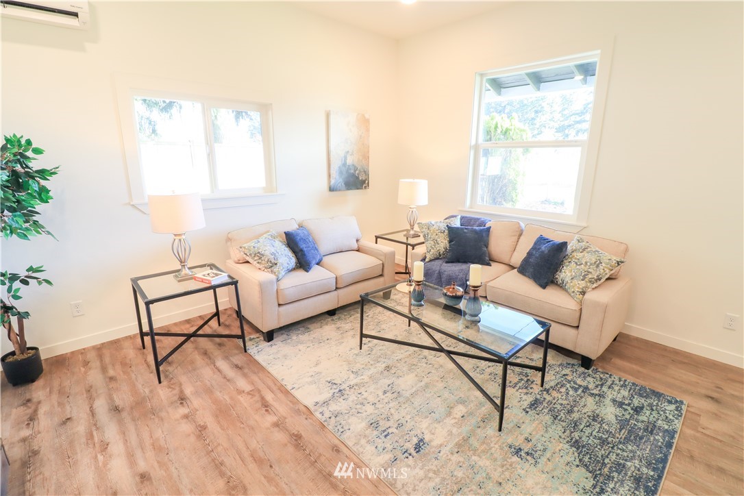 9331 Cullens Road Southeast Yelm, WA 98597 - Photo 8 of 28 a living room with furniture and a window