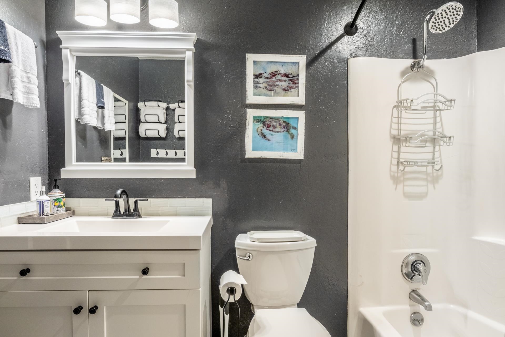 2289 Sierra Nevada Road, Unit F3 Mammoth Lakes, CA 93546 - Photo 12 of 17 Bathroom with shower / bath combination, vanity, and a textured wall
