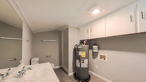 a bathroom with a sink and a toilet