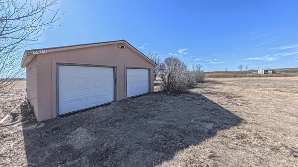 a view of back yard of the house