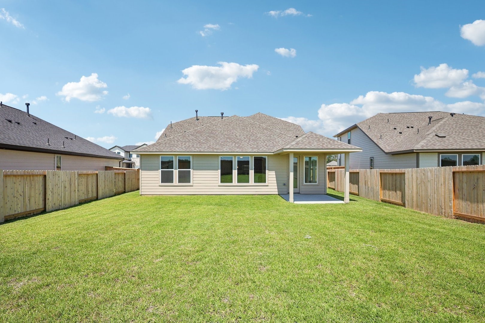 14459 Trumpet Lane Splendora, TX 77372 - Photo 21 of 25 Spacious backyard with covered patio