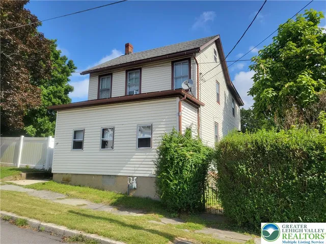 a view of a house with a patio