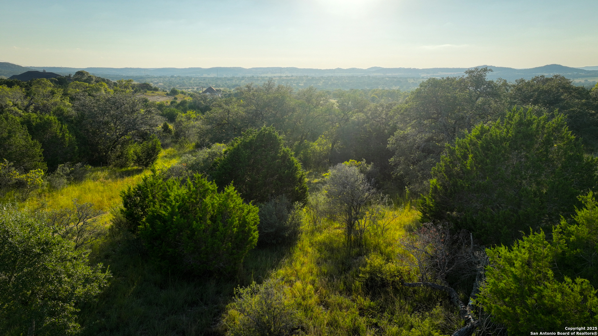 Tract 4 Jungfrau Hill Road Comfort, TX 78013 - Photo 12 of 25 a view of a lake and green valley