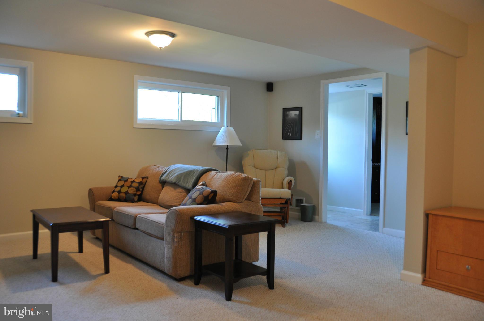 8621 Victoria Road Springfield, VA 22151 - Photo 12 of 27 a living room with furniture