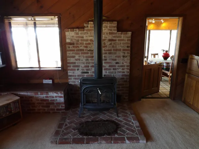 a room with a window and a bicycle