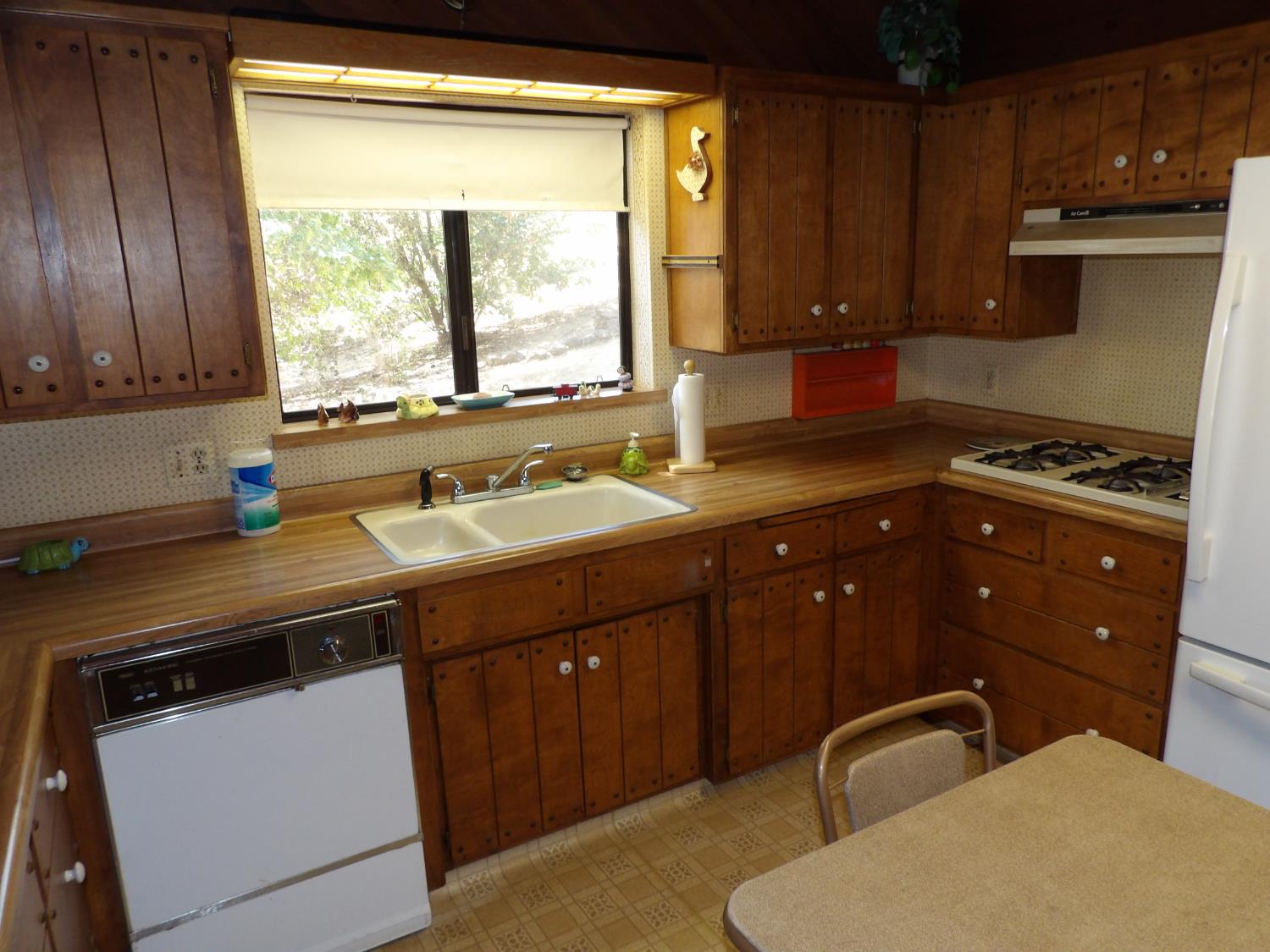 52925 Hogback Miramonte, CA 93603 - Photo 4 of 89 a kitchen with a sink stove and cabinets