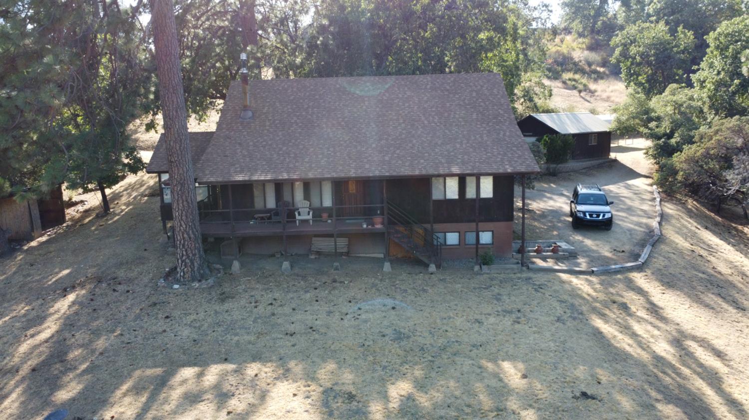 52925 Hogback Miramonte, CA 93603 - Photo 83 of 89 a view of a house with a yard and a tree