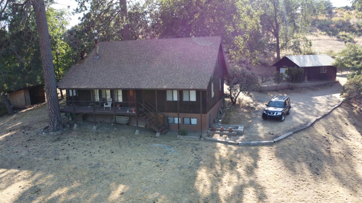 52925 Hogback Miramonte, CA 93603 - Photo 84 of 89 a view of a house with backyard and sitting area