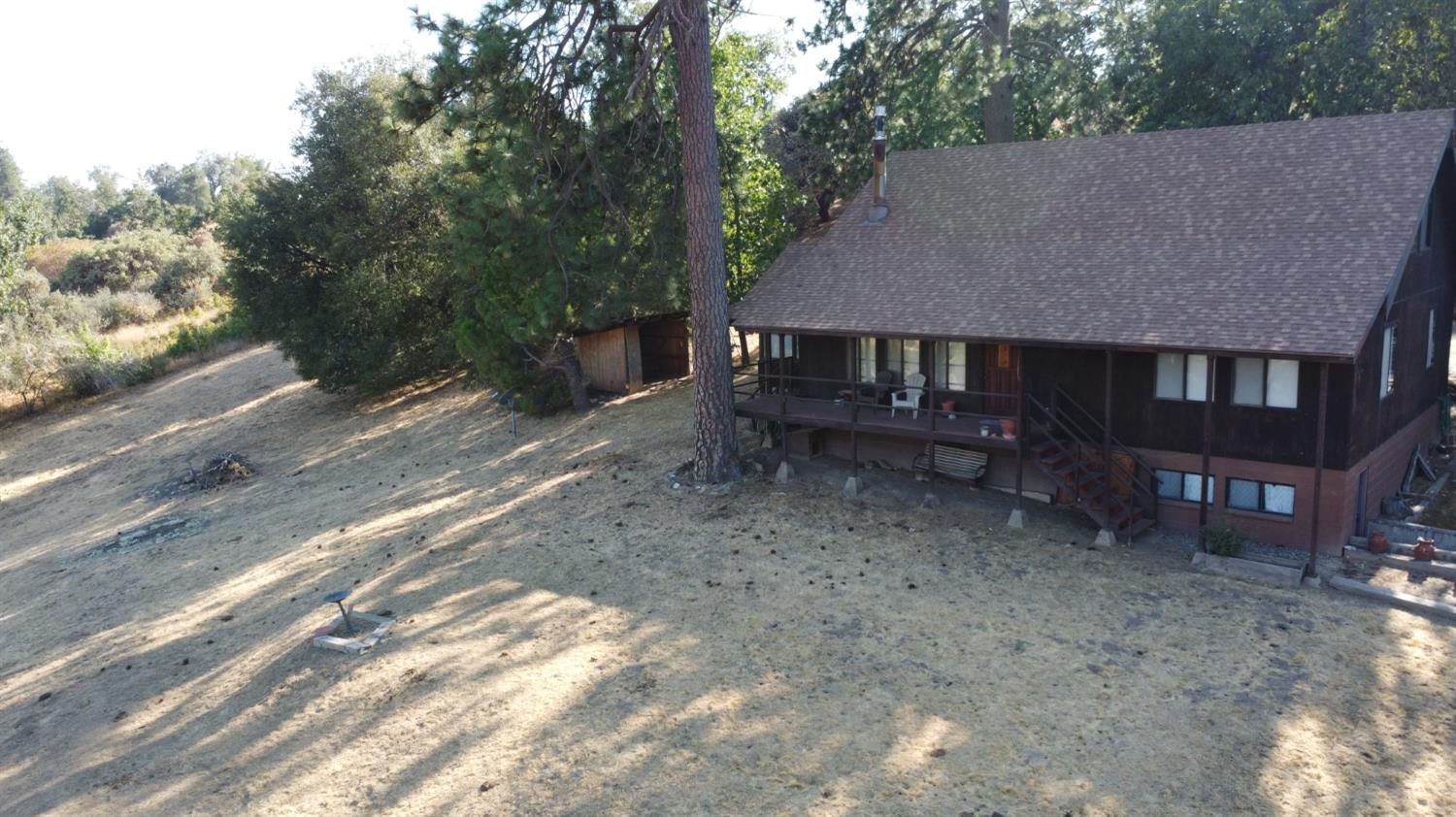 52925 Hogback Miramonte, CA 93603 - Photo 85 of 89 a view of a house with a yard and sitting area