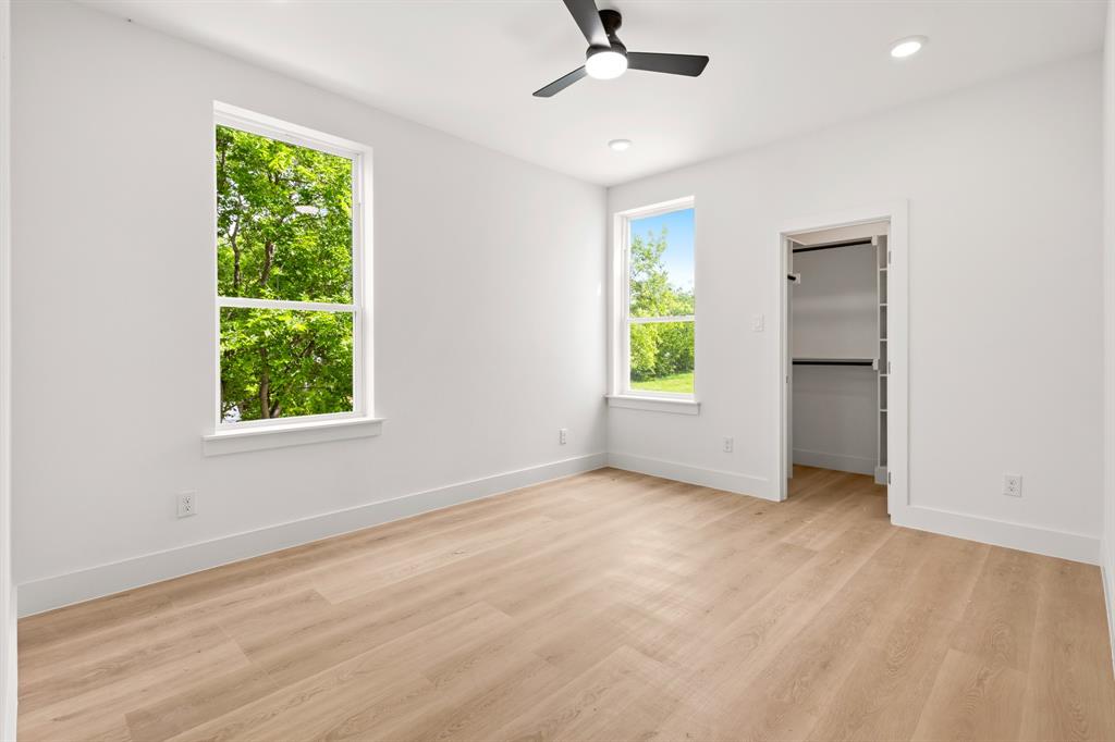 413 North Patton Avenue Dallas, TX 75203 - Photo 14 of 21 an empty room with windows and closet