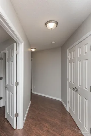 wooden floor and an entryway in a room