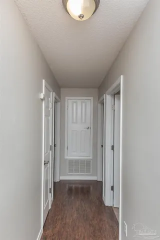 a view of entryway with bathroom