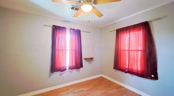 a view of an empty room with window