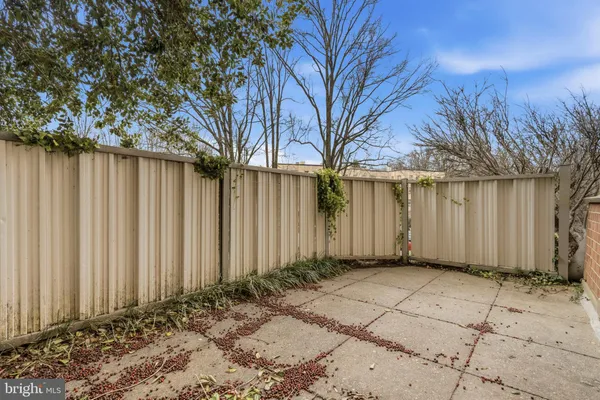 a view of a backyard of the house