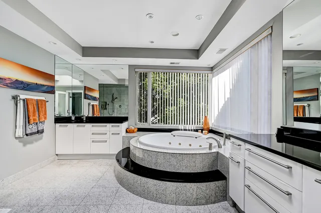 a view of a kitchen with a large window