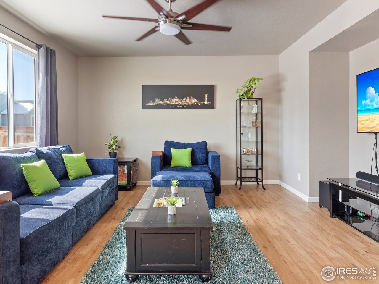 465 Country Road Berthoud, CO 80513 - Photo 7 of 34 Light and Bright Main Level Living Room