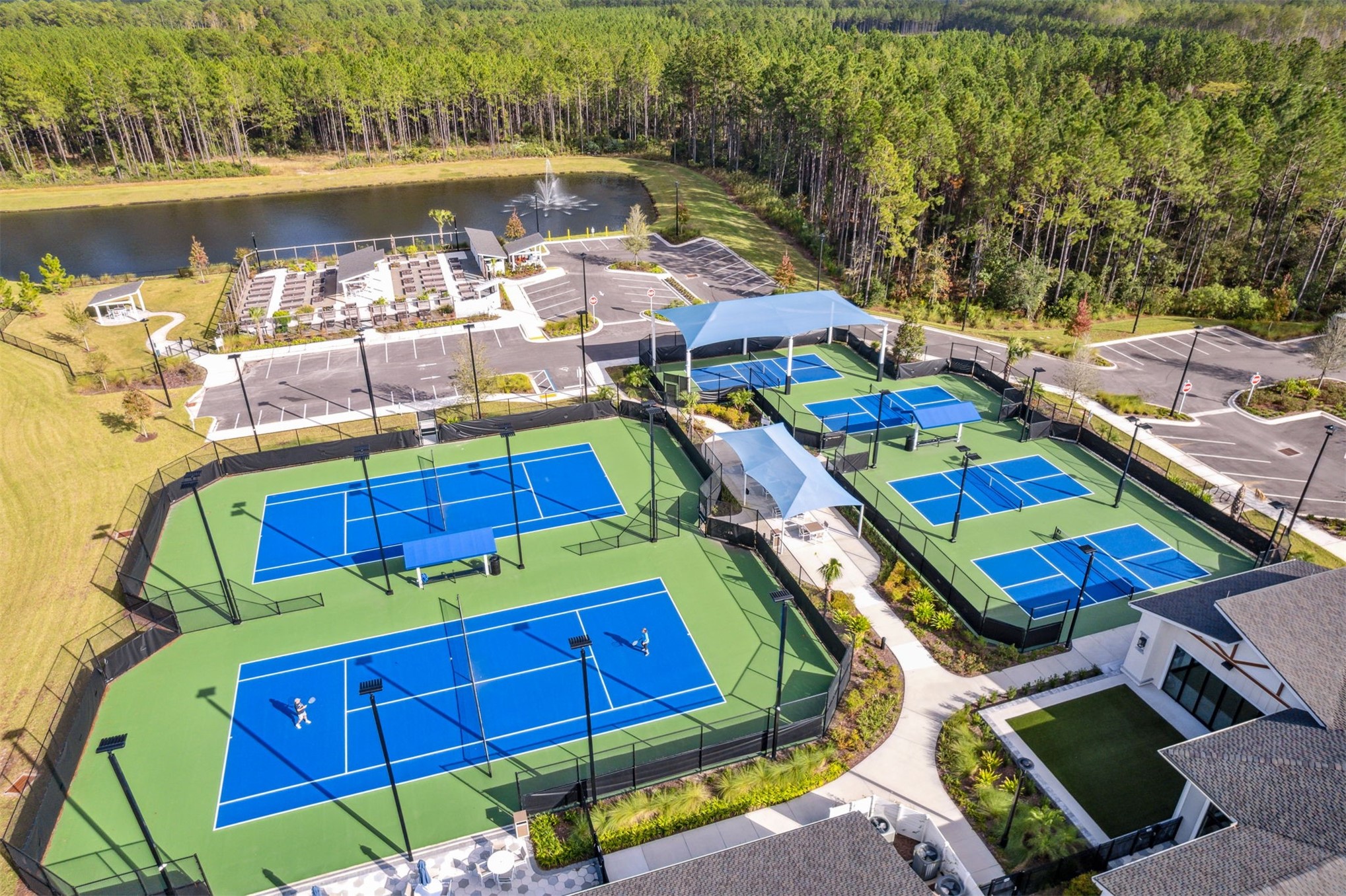 540 Jubilee Circle Yulee, FL 32097 - Photo 31 of 42 a aerial view of a swimming pool with outdoor seating and yard
