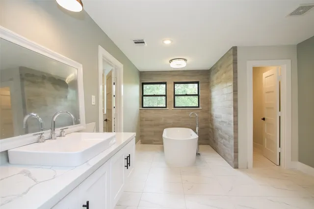 a bathroom with a sink and a toilet
