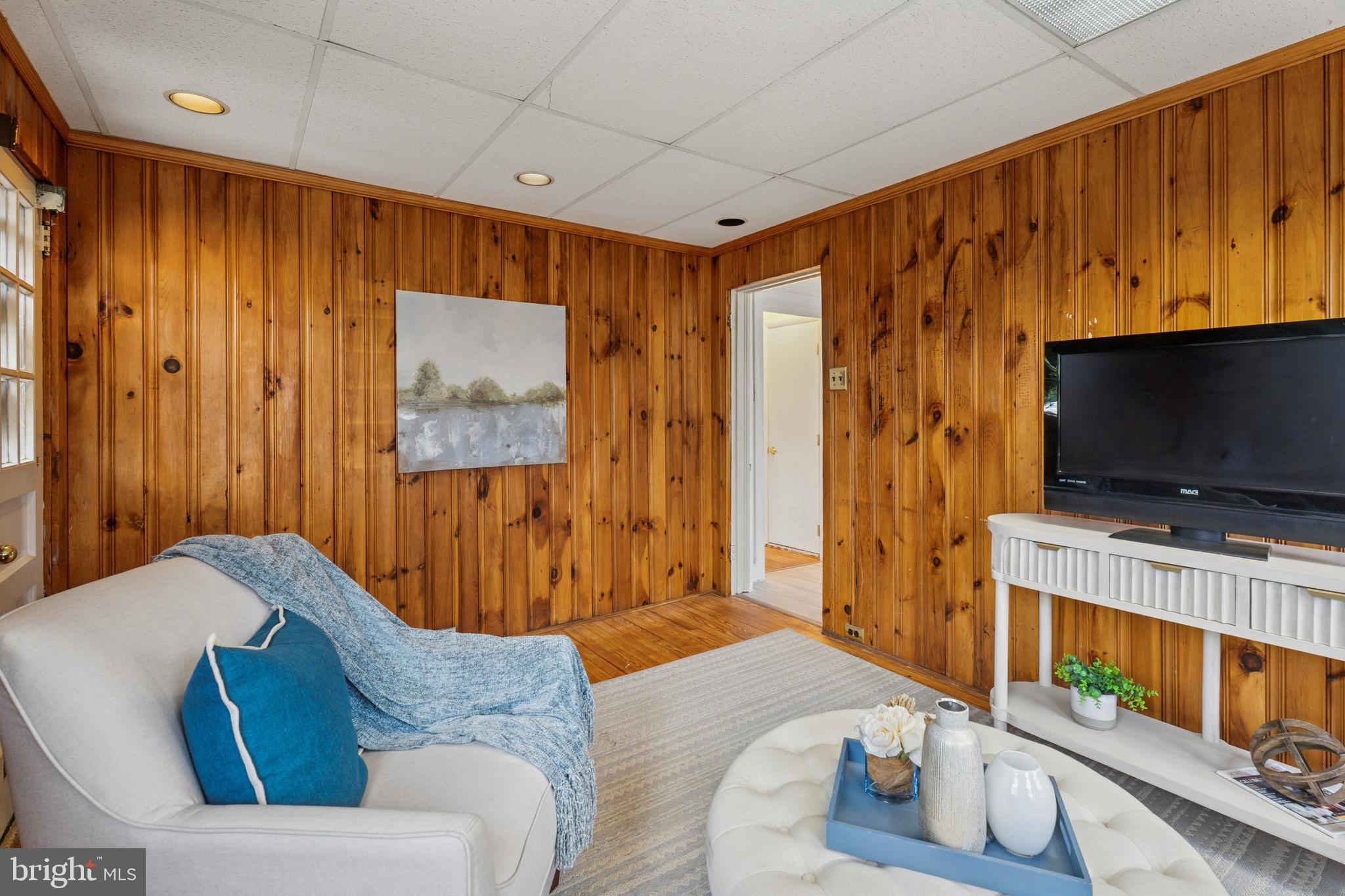 2501 West Darby Road Havertown, PA 19083 - Photo 14 of 30 a living room with furniture and a flat screen tv