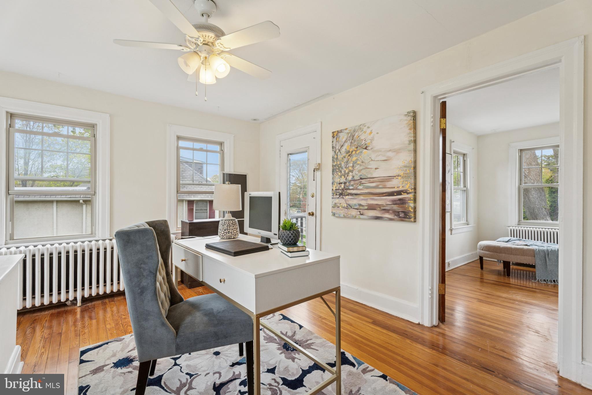 2501 West Darby Road Havertown, PA 19083 - Photo 16 of 30 a workspace with furniture window and wooden floor