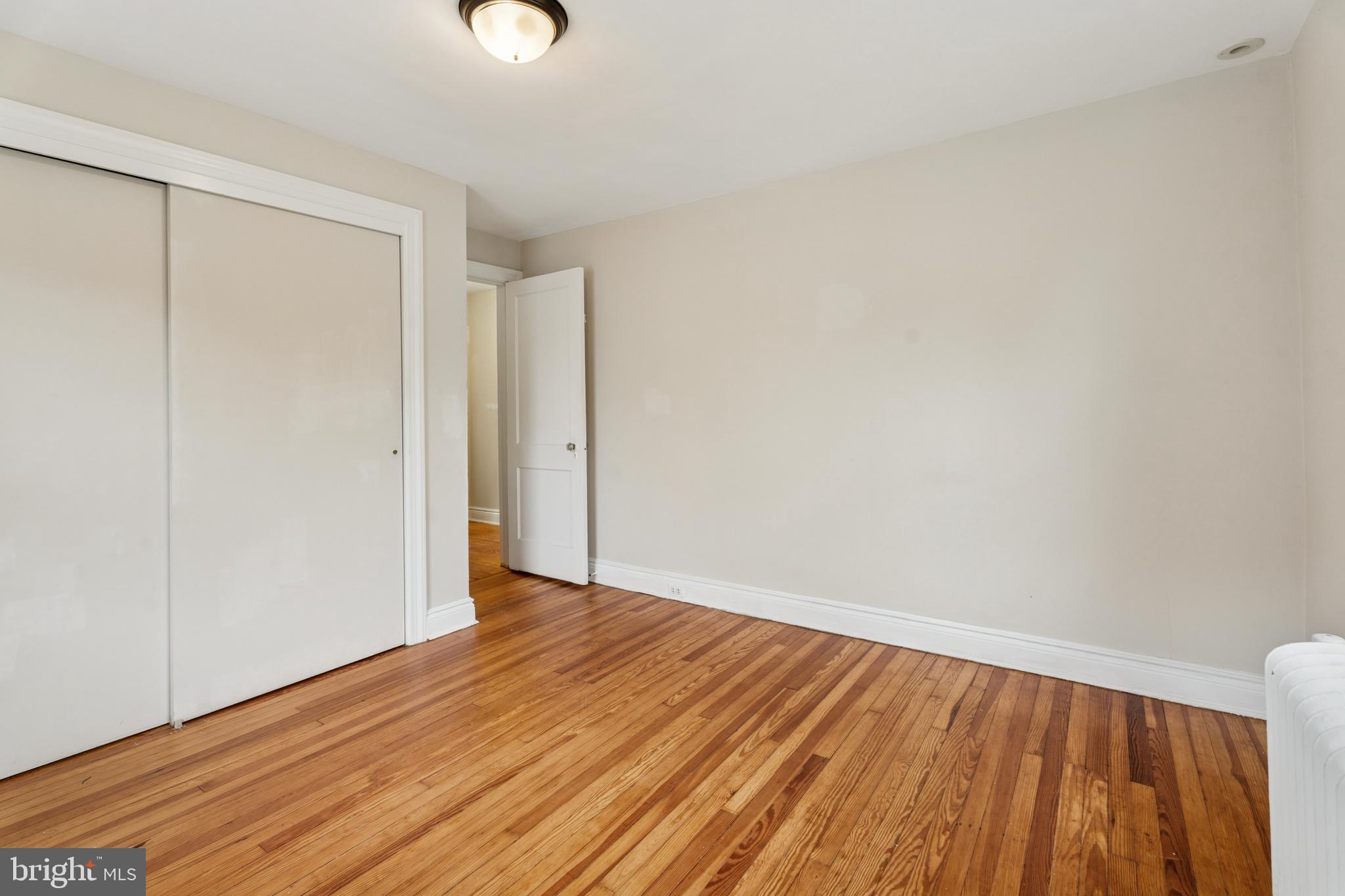 2501 West Darby Road Havertown, PA 19083 - Photo 28 of 30 a view of an empty room with wooden floor