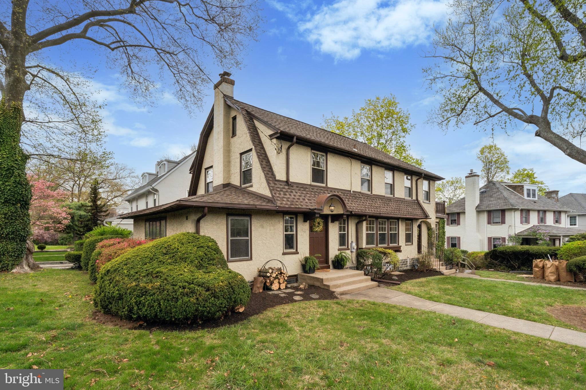 2501 West Darby Road Havertown, PA 19083 - Photo 30 of 30 a front view of a house with a garden and trees