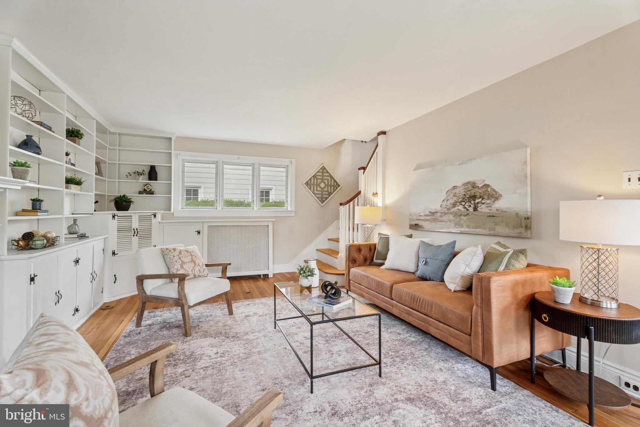 2501 West Darby Road Havertown, PA 19083 - Photo 4 of 30 a living room with furniture and a lamp