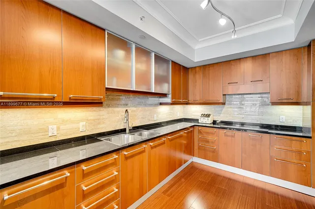 a living room with couch and a floor to ceiling window