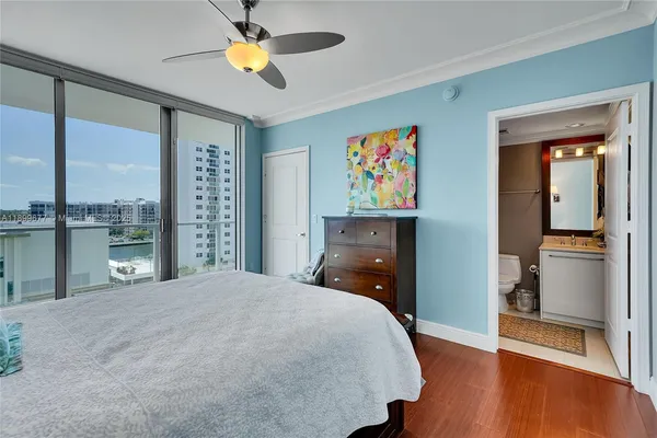 a view of a room that has a bed and a chair