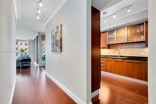 a living room with lots of furniture and a flat screen tv