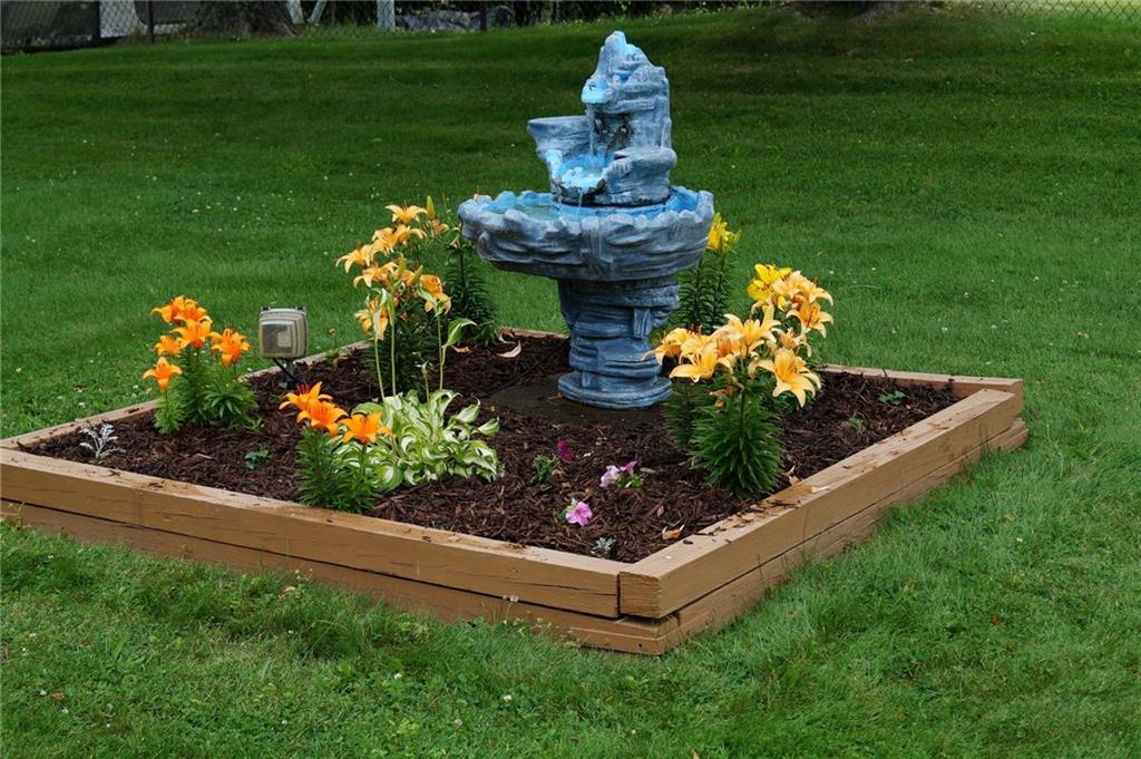 43 Munntown Road Eighty Four, PA 15330 - Photo 19 of 25 Fountain and flower box in the back yard 43 Munntown Road