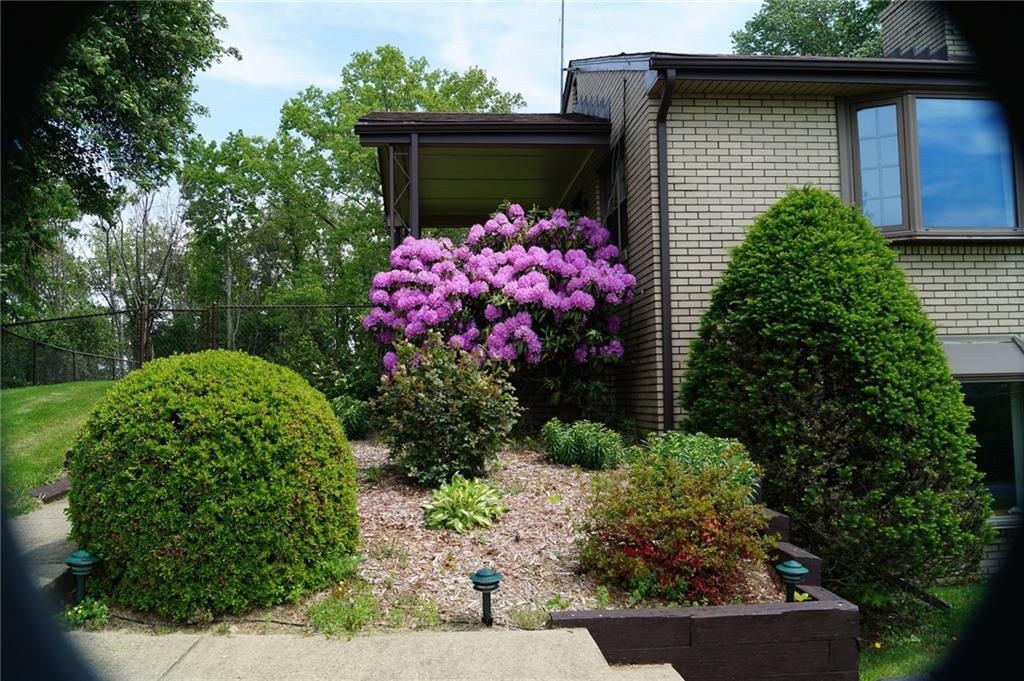 43 Munntown Road Eighty Four, PA 15330 - Photo 21 of 25 Exterior Front flowers 43 Munntown Road