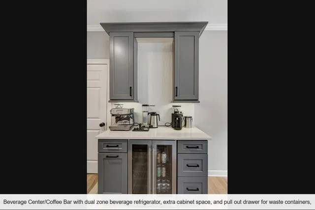 a bathroom with a sink vanity and a mirror