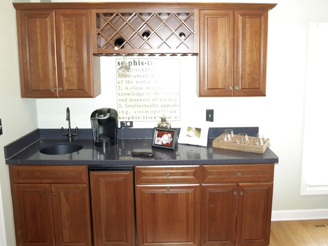 659 Aberdeen Road Inverness, IL 60067 - Photo 6 of 25 a kitchen with granite countertop a sink stainless steel appliances and cabinets