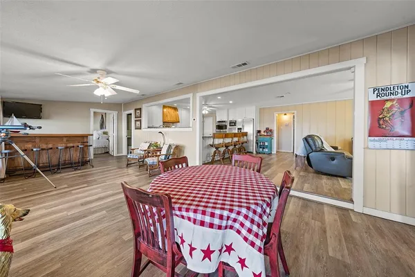 a view of a dining room with furniture