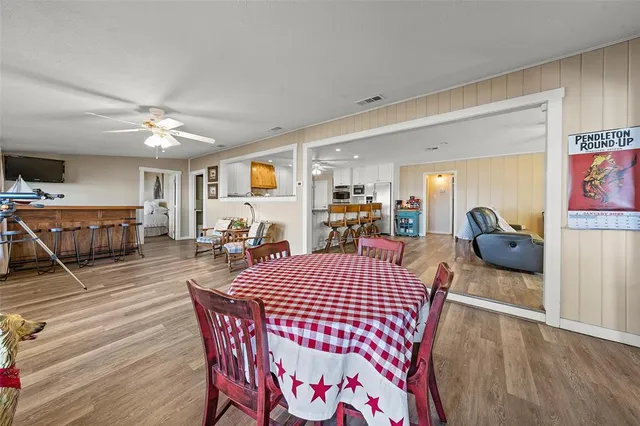 a view of a dining room with furniture