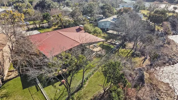 a kitchen with a sink stove and refrigerator