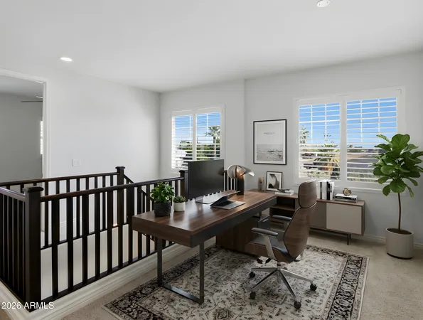 a view of hallway with windows