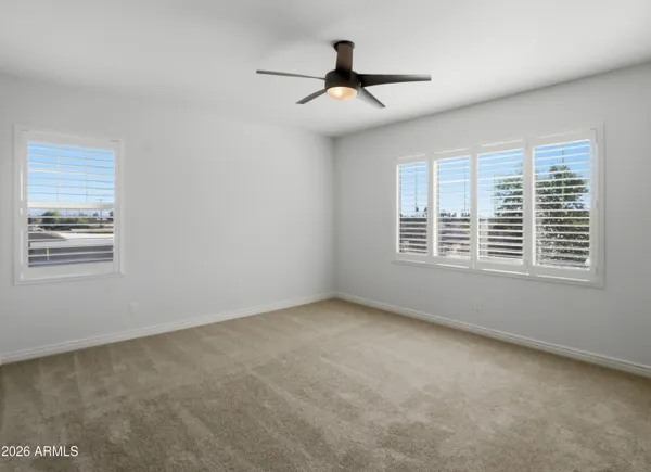 a view of a hallway with a wooden floor