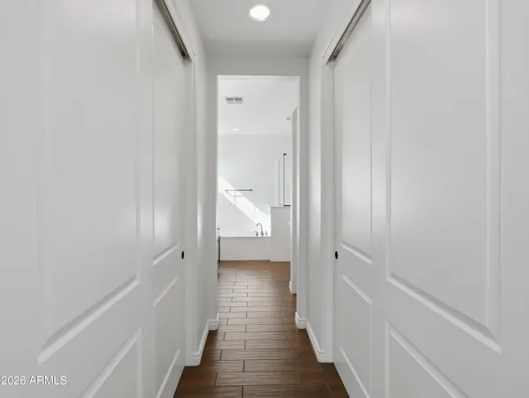 a view of a room with shelf on the wall