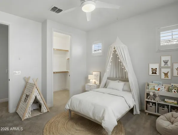 an empty room with a empty space and windows