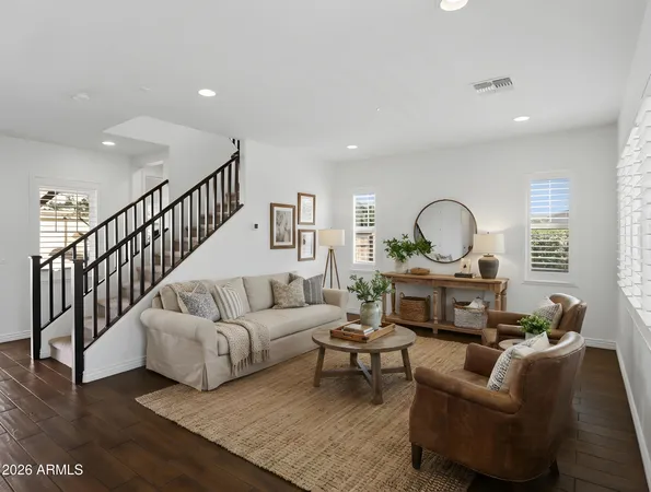 a view of an entryway with wooden floor