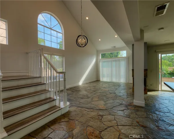 a view of entryway with a front door