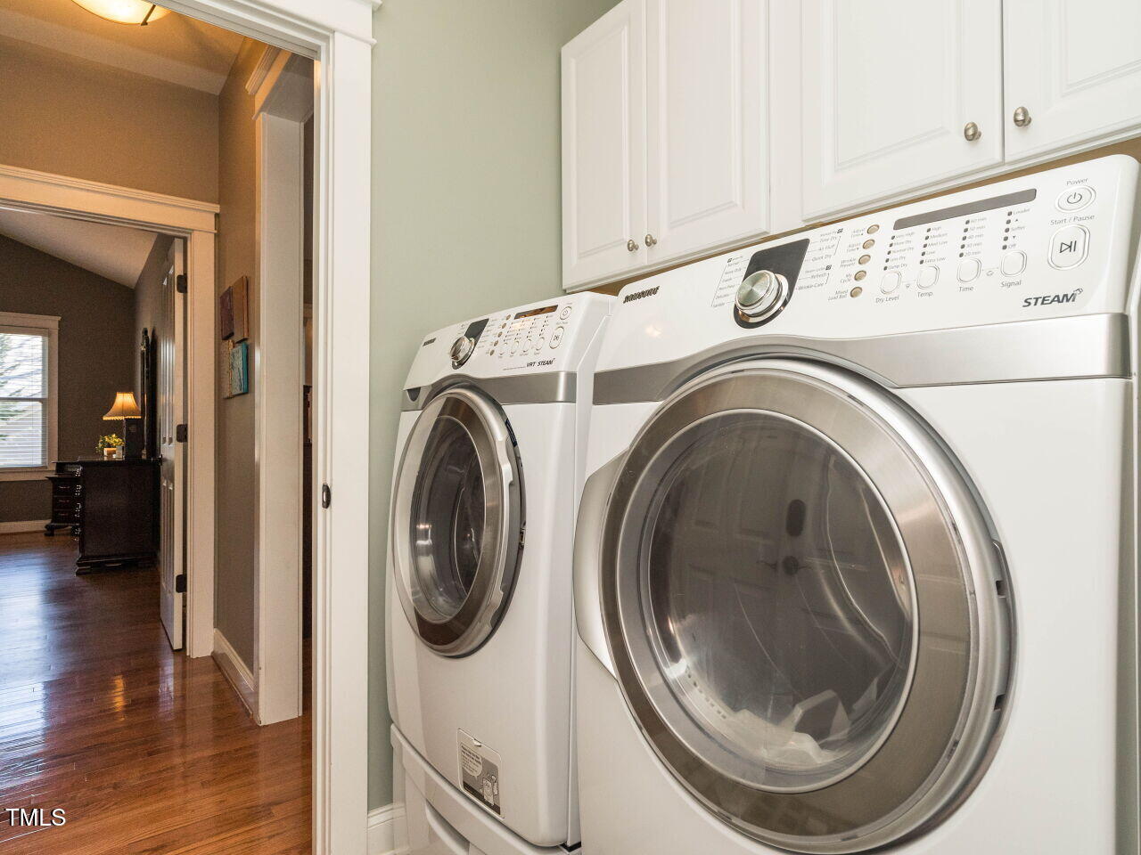114 Naperville Drive Cary, NC 27519 - Photo 23 of 36 a utility room with dryer and washer