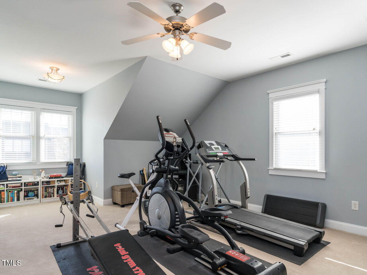 114 Naperville Drive Cary, NC 27519 - Photo 27 of 36 a view of a room with gym equipment