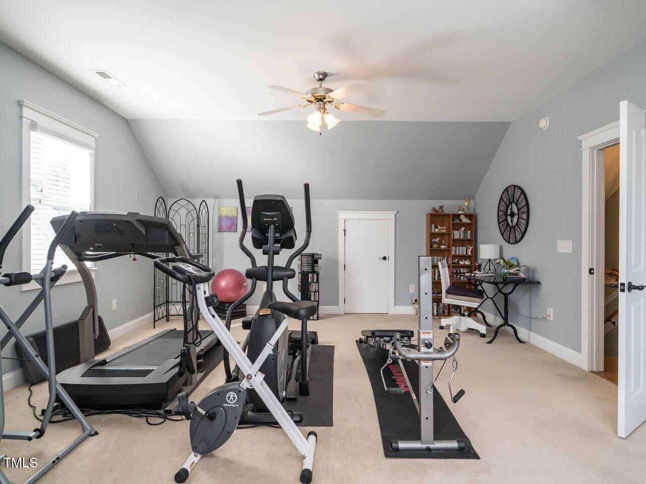 114 Naperville Drive Cary, NC 27519 - Photo 28 of 36 a view of a room with gym equipment